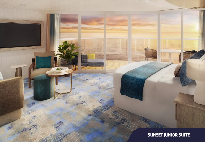 Foto da cabine Sunset Junior Suite com cama, poltrona e varanda com vista para o mar